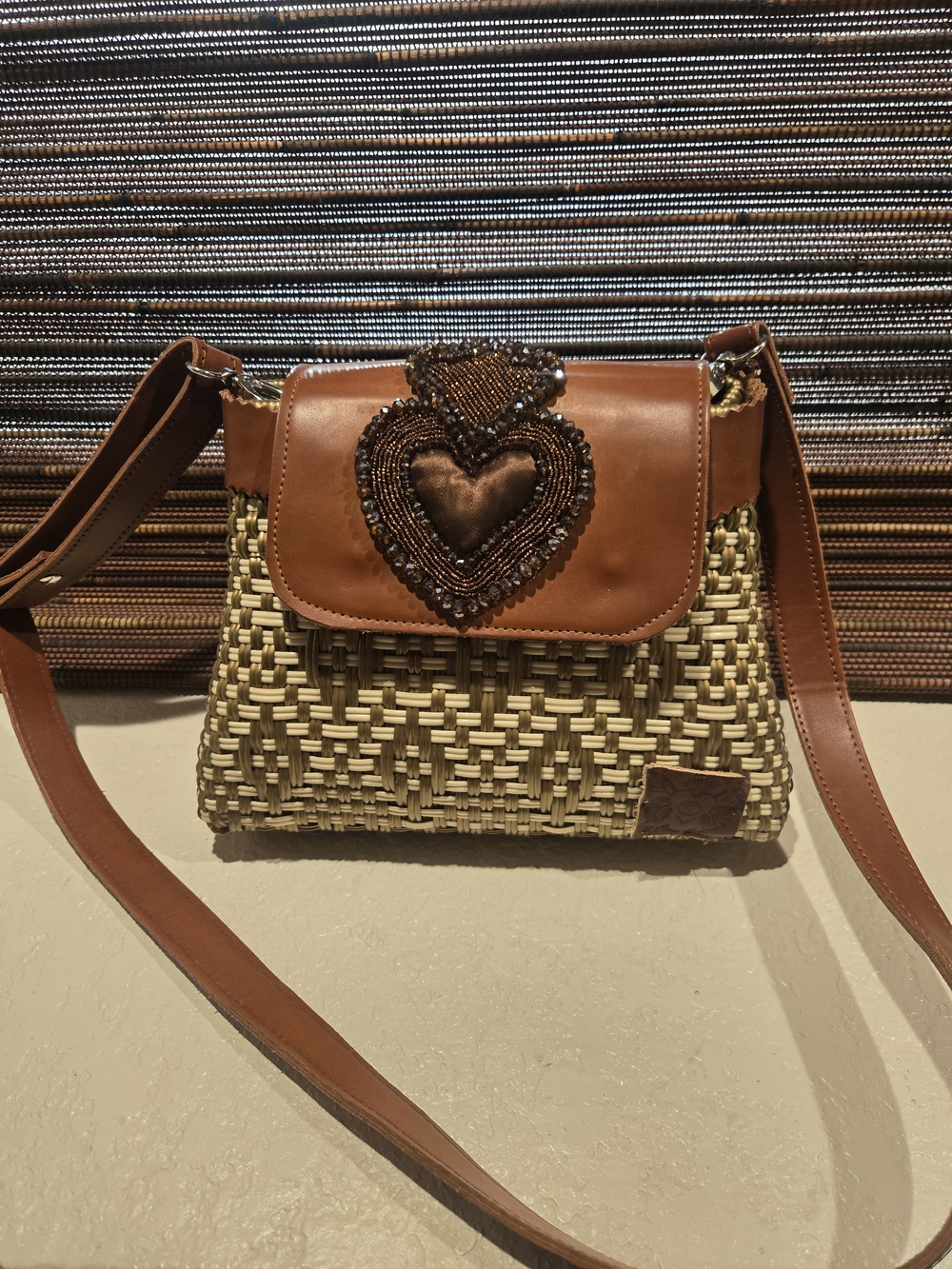 Woven Crossbody Bag with Brown Beaded Heart Accent
